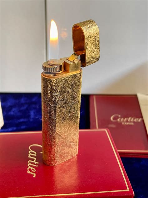 cartier feuerzeug gold